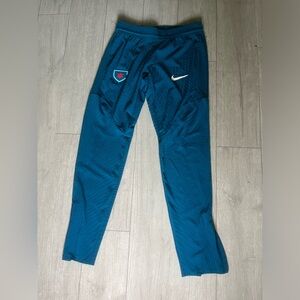 Nike Dri- Fit ADV Chicago Stars 
Athletic Pants Women's Teal blue zip bottom.